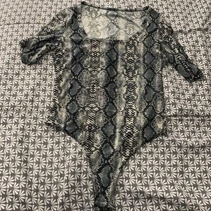 grey leopard body suit